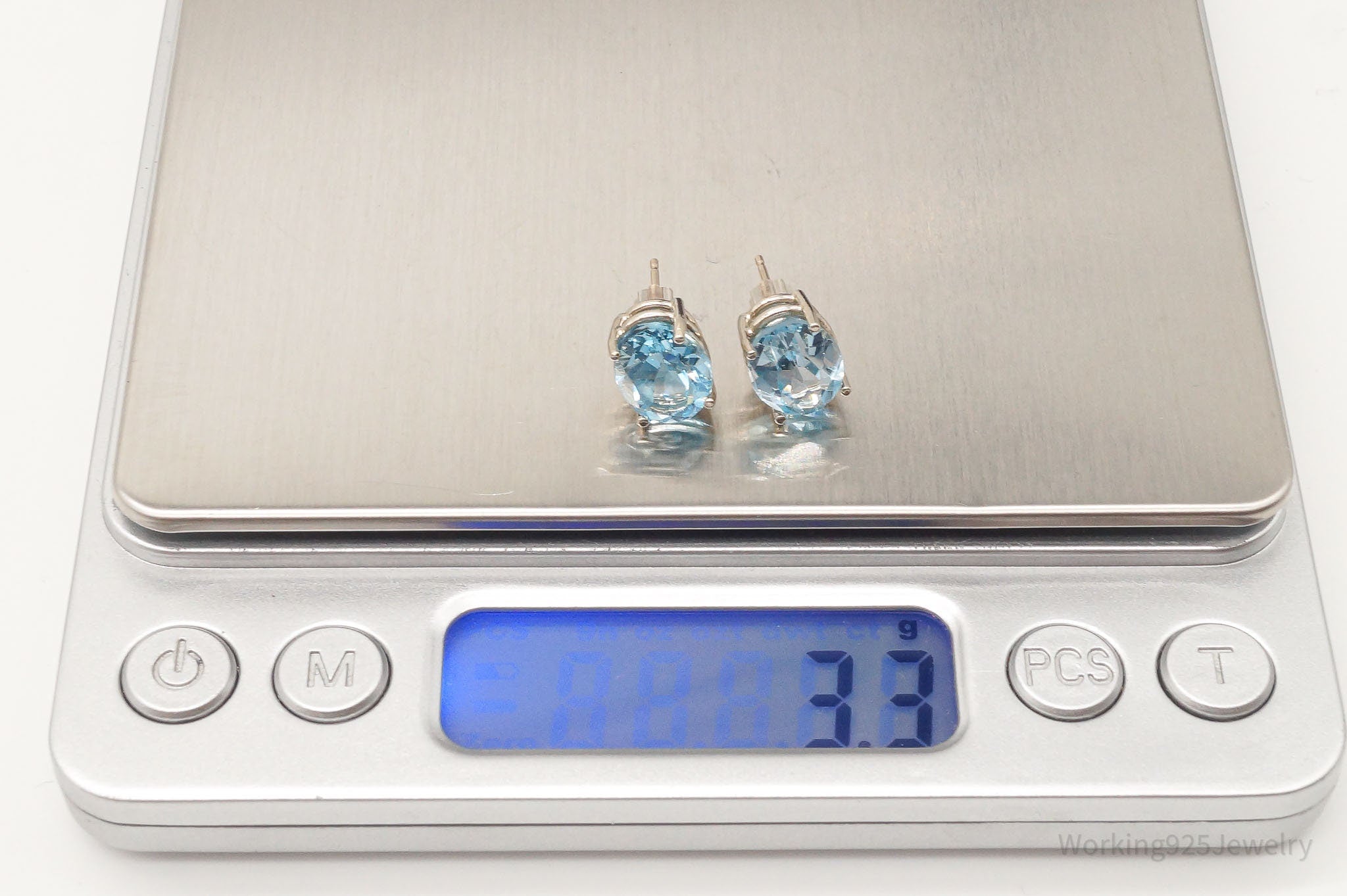 Oval Blue Topaz 14K White Gold Stud Earrings