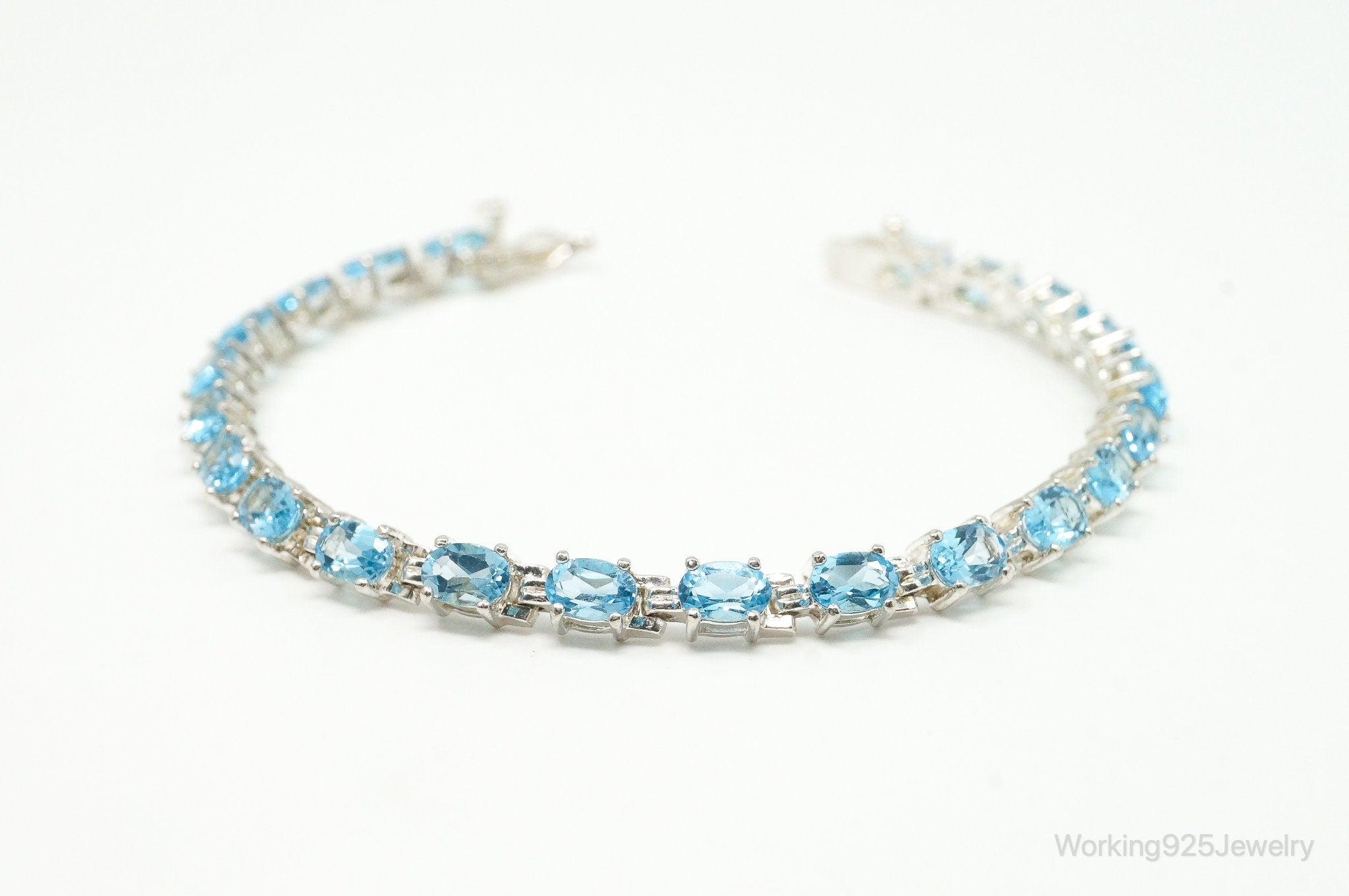 Vintage Designer ALX Blue Topaz Sterling Silver Tennis Bracelet