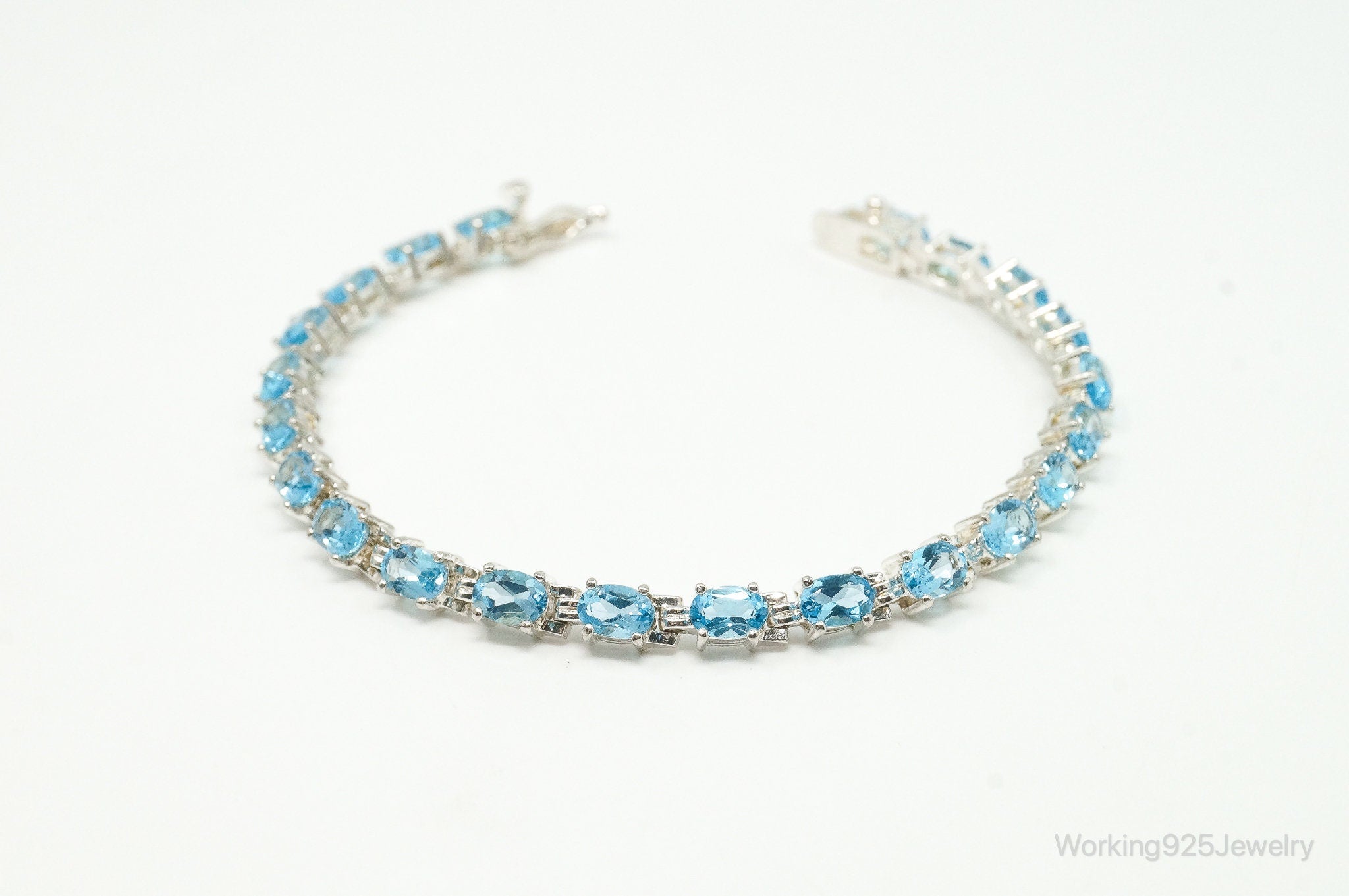 Vintage Designer ALX Blue Topaz Sterling Silver Tennis Bracelet