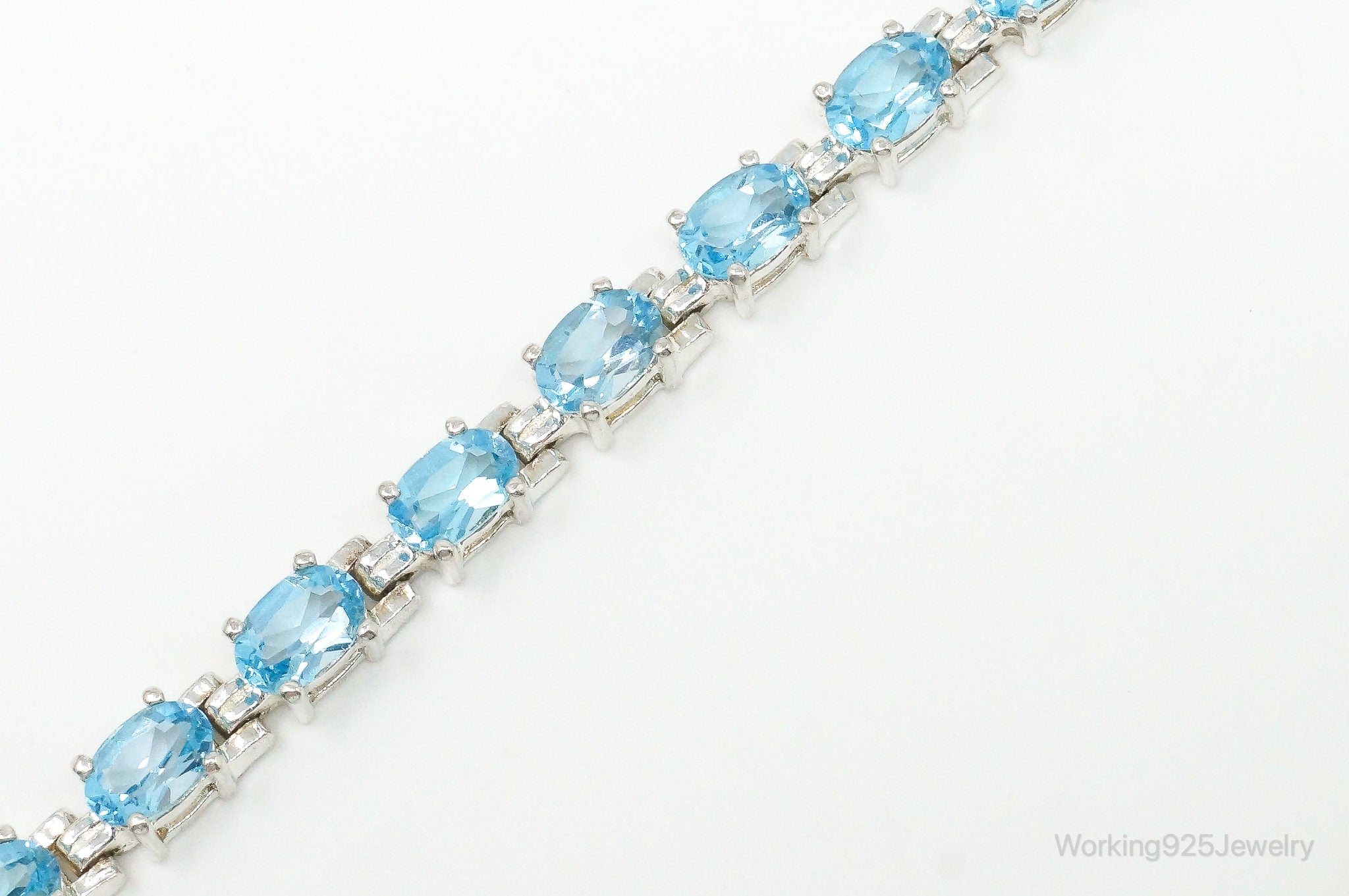 Vintage Designer ALX Blue Topaz Sterling Silver Tennis Bracelet